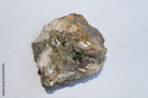 Turmaline or black schorl in a rock isolated on a white background 
 photo