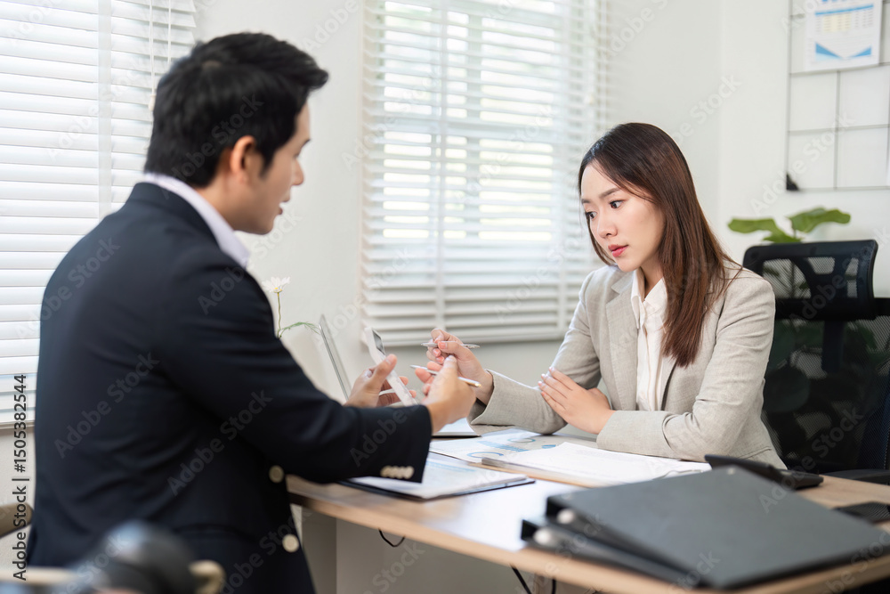Professional Financial Meeting. Client and advisor discussing financial plans and goals. Professional Financial Meeting. Client and advisor discussing financial plans and goals.