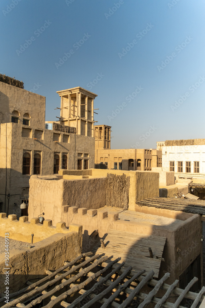 Fototapeta premium vertical view of old city of Dubai, Dubai Al Fahidi historical neighborhood, Al Bastakiya, Al seef Dubai