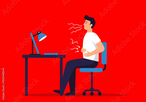 Man Experiencing Stomach Pain While Working at His Desk