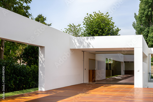 Modern house entrance with a beautiful garden and contemporary exterior design