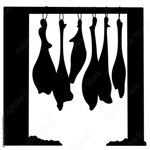 Silhouette of hanging meat in cold storage – traditional butchery and preservation