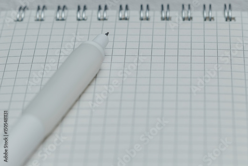Close-up of white pen tip o...