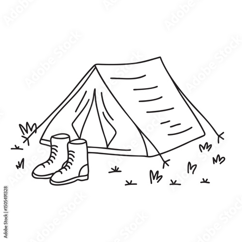 A tent near a pair of boots on the ground