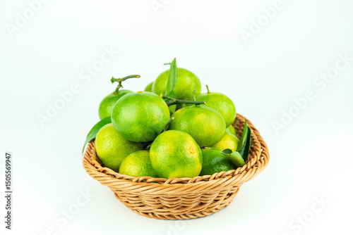 Fototapeta Naklejka Na Ścianę i Meble -  Fresh orange fruits placed in the fruit basket