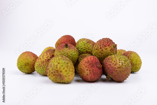 Fresh lychees on a white background