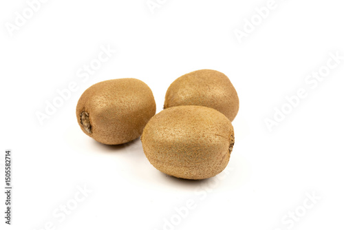 Fototapeta Naklejka Na Ścianę i Meble -  Three fresh kiwifruit fruits