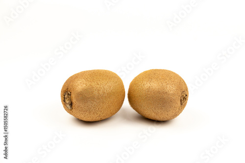 Fototapeta Naklejka Na Ścianę i Meble -  Three fresh kiwifruit fruits