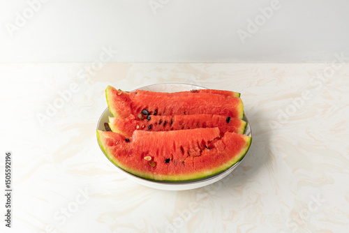 The fresh watermelon on the plate