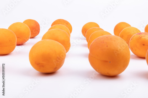 Neatly arranged fresh apricot fruits