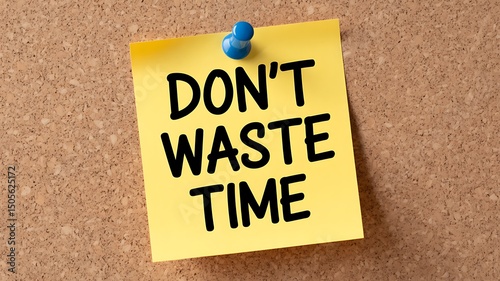 A yellow sticky note with the words don't waste time pinned to a cork board with a pin