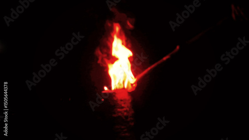 Attractive night bonfire. This fire magic is real. Man can look at the fire all night long without getting tired. In tribal era of nomadic life, it was necessary to keep fire constantly, fire keeper