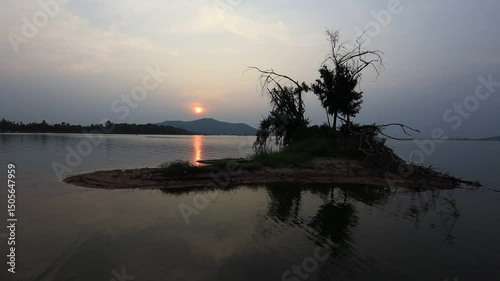 Natural video background of a high-angle atmosphere on a mountain that overlooks the surrounding scenery(mountains, trees,sea)from a scenic vantage point,with a wooden chair for sitting and resting photo