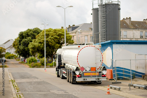 Fuel Tanker Truck Rear View in Industrial Urban Zone