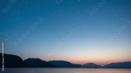 Wallpaper Mural a a movement of stars in the night sky with the view of mountains. Torontodigital.ca