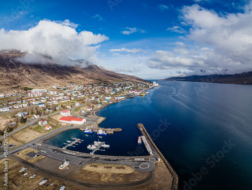 Aerial view of Fáskrúðsfjörður fishing village and harbor in East Iceland...