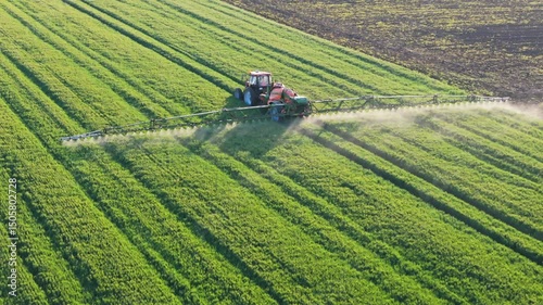 Farming Technology and Sustainability. Drone Shot of Crop Spraying