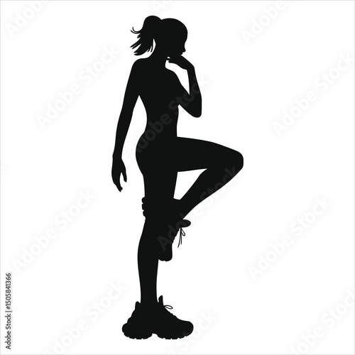 (chunky sneakers)Vector Silhouette of a Woman Exercising/A striking silhouette of a woman in athletic wear, poised in a dynamic exercise pose.