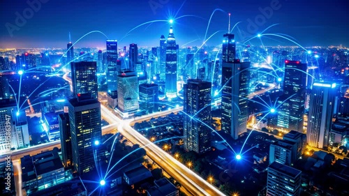 Wallpaper Mural Top down night view of a smart city skyline interconnected by glowing blue lines, symbolizing digital communication, IoT, and data networks in an urban infrastructure. Torontodigital.ca