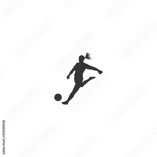 Soccer player woman silhouette kicking ball in mid air action shot