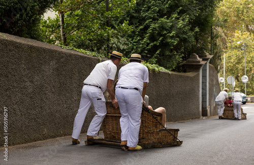 Fotografie Group of (Carreiros) runners with traditional wicker basket car