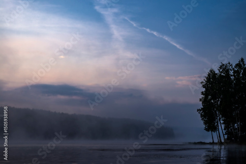 misty morning on the river, fog over the lake