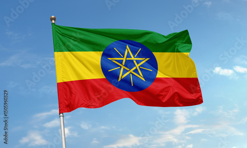 Konstfotografi Ethiopian national flag with star emblem waving in the sky