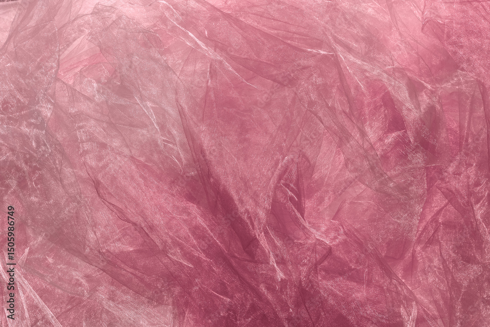 Fototapeta premium Pink crumpled organza fabric texture background.