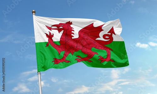 Fotografie Welsh flag with red dragon flying in wind
