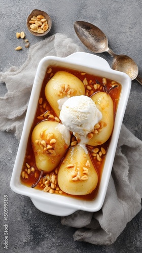 Delicious Poached Pears With Ice Cream Topped With Nuts and Caramel Sauce.