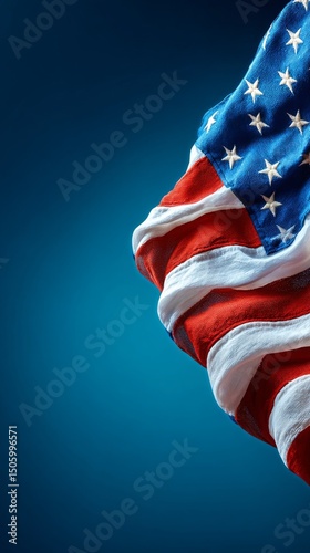 Waving American Flag Against a Blurred Blue Background in Daylight.
