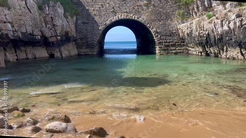 Fortress wall with a tunnel to the sea. Peniche Fortress in Portugal