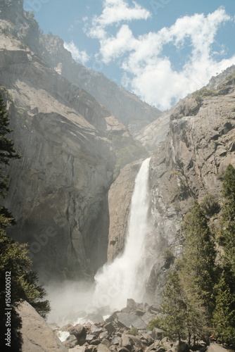 Yosemite National Park in California’s Sierra Nevada mountains aesthetic greenery landscape scenery on sunny day granite cliffs and waterfall