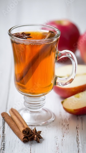 Warm Apple Cider With Cinnamon and Star Anise Served With Fresh Apple Slices