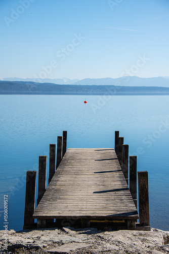 Wooden walk way in the blue lake landscape