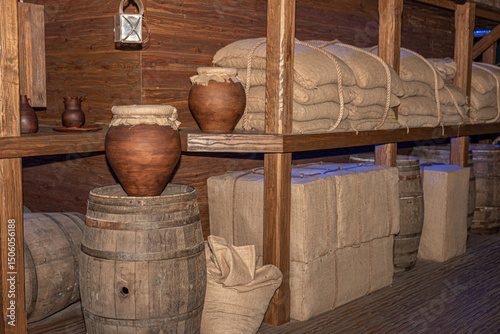 Rustic warehouse with sea voyage provisions, sacks and barrels