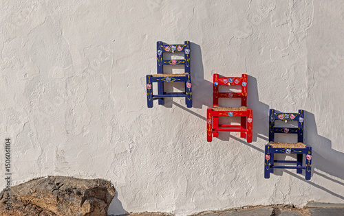 Typical Andalusian chairs, color and tradition in Seville, Spain