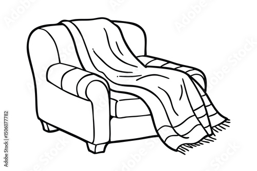 Cozy armchair with a soft knitted blanket