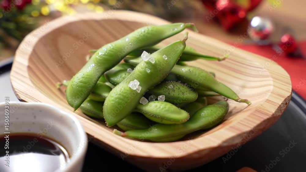 Fresh Edamame With Salt And Soy Sauce In Wooden Bowl Closeup Fresh Edamame With Salt And Soy Sauce In Wooden Bowl Closeup