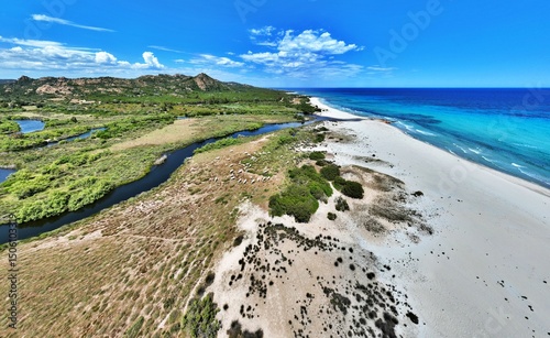 Fototapeta Naklejka Na Ścianę i Meble -  Aerial view of Berchida beach south of Siniscola, in the Baronie territory on the east coast of Sardinia island is known as one of the most beautiful beaches in the Mediterranean for its purest waters