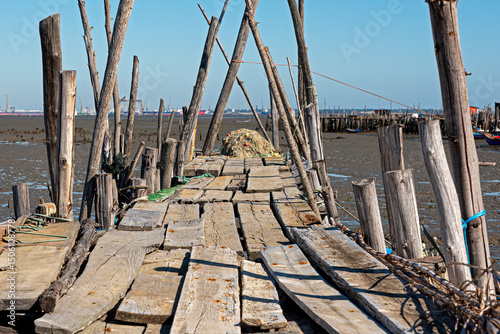 Low tide jetty with nets
