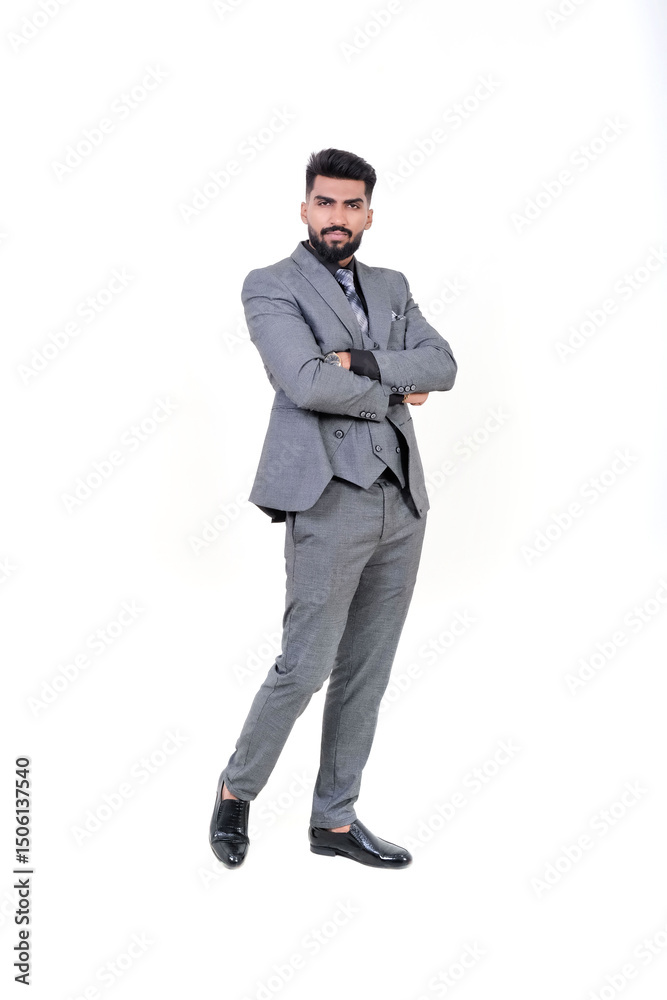 A man in an elegant gray suit with a tie and watch, a stylish business look on a white background. A man in an elegant gray suit with a tie and watch, a stylish business look on a white background.