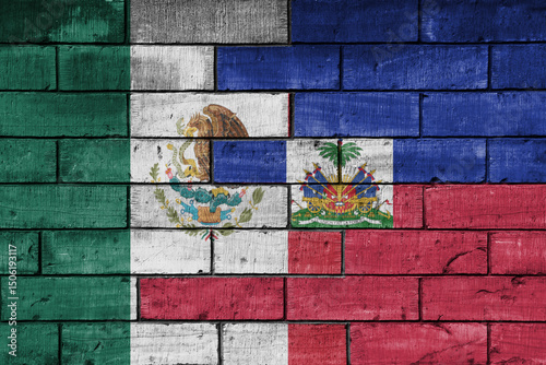 Canvas Print colourful painted big national flag of mexico and flag of haiti on a massive old brick wall background