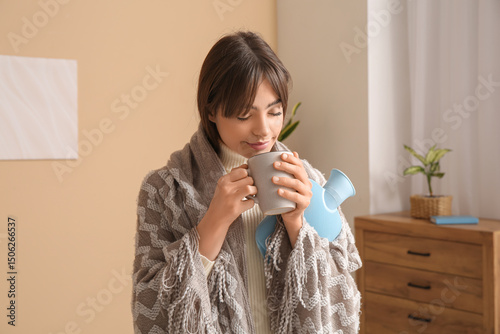 Young woman with blanket, h...