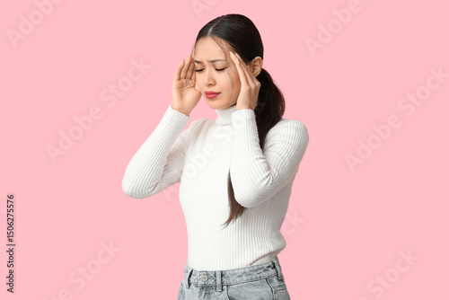 Young Asian woman suffering...