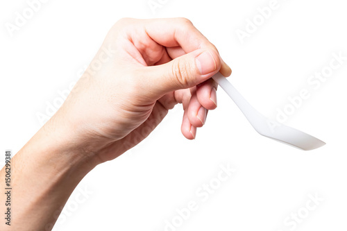 Male hand holding a white plastic spoon isolated on white background.