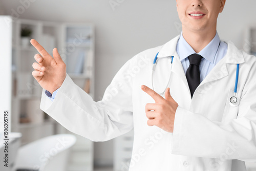 Male doctor pointing at som...