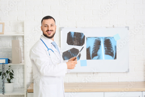 Male doctor with x-ray scan...