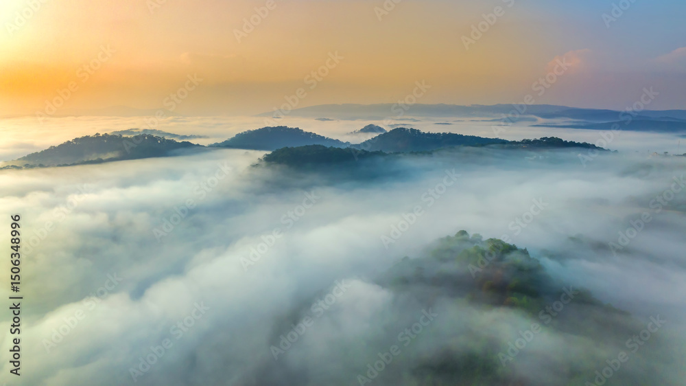 Obraz premium Aerial view of Xuan Tho suburbs near Da Lat city at morning with misty and sunrise sky. This place is considered most beautiful and peaceful place to watch sunrise in highlands of Vietnam