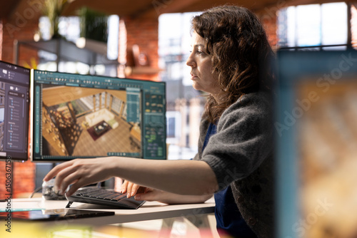 Woman in a modern office creates a 3D render of an apartment interior, utilizing architectural software. Developer uses digital tool to decorate detailed home design, configuring virtual assets.
